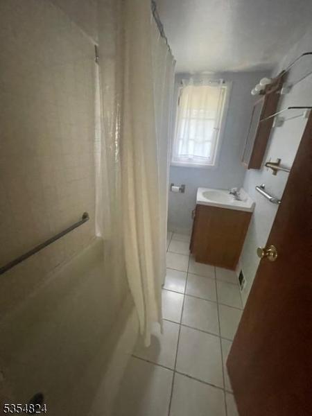 218 Wawayanda Rd, Vernon Twp, NJ 07422 - full bath with a shower with curtain, tile patterned flooring, and vanity