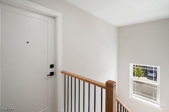 interior space with an upstairs landing