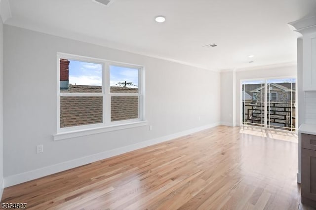 spare room with recessed lighting, baseboards, visible vents, and light wood-style flooring