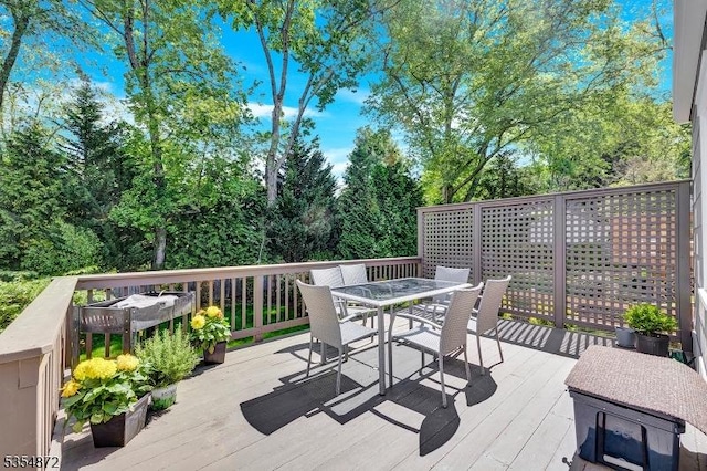 deck featuring outdoor dining space