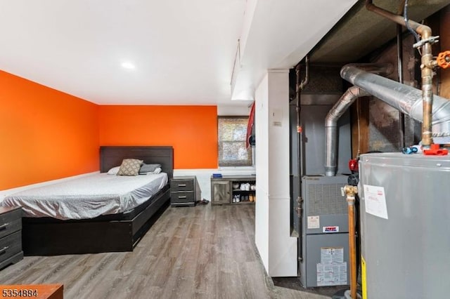 bedroom with wood finished floors