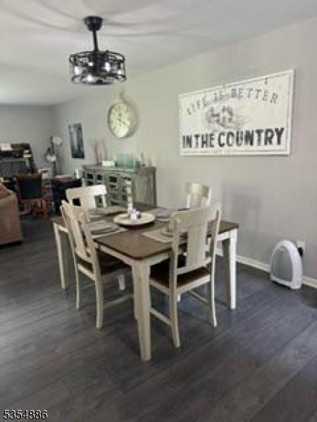1301 Spruce Hills Dr, Glen Gardner Boro, NJ 08826 - dining area featuring baseboards and dark wood-style flooring