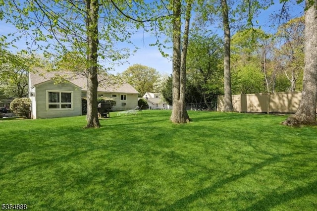 view of yard with fence