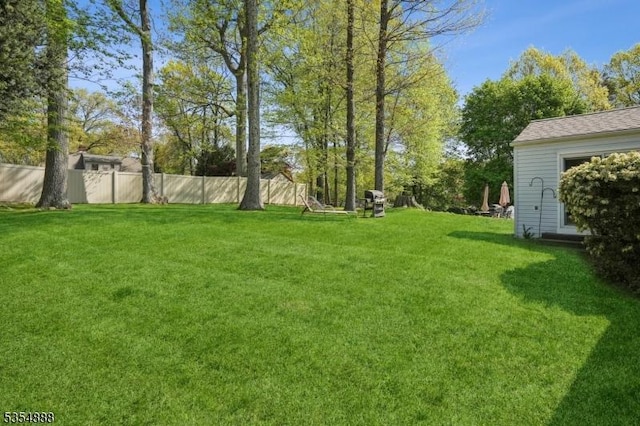 view of yard featuring fence
