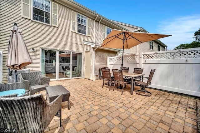 view of patio / terrace with fence and outdoor dining area