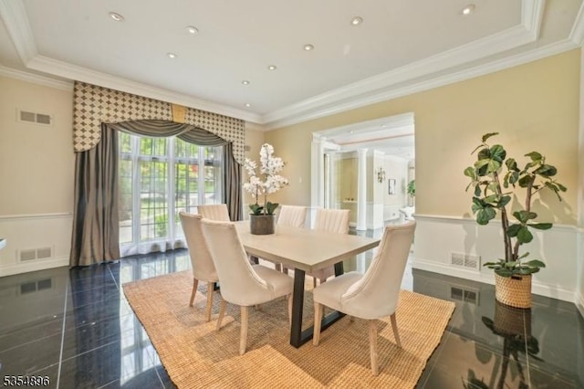 dining area featuring crown molding and visible vents