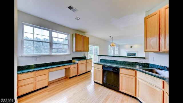 27 Suydam Rd, Franklin Twp, NJ 08873 - kitchen featuring black dishwasher, dark countertops, light brown cabinetry, light wood-style flooring, and a sink