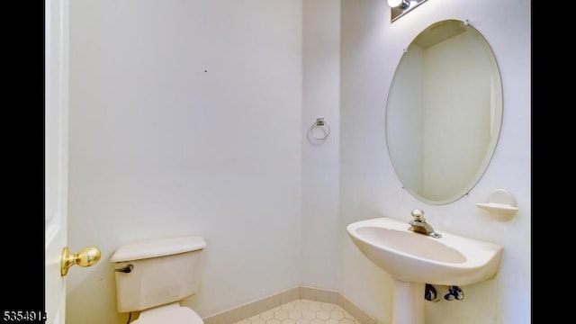 27 Suydam Rd, Franklin Twp, NJ 08873 - bathroom with toilet and baseboards