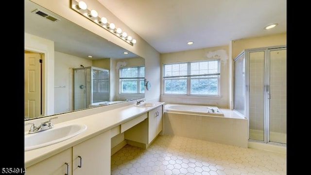 27 Suydam Rd, Franklin Twp, NJ 08873 - full bathroom featuring a shower stall, a bath, double vanity, and recessed lighting