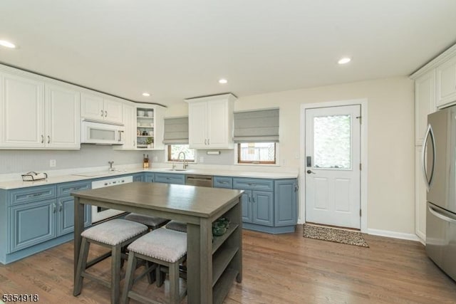 12 Johnson Ave, Hopatcong Boro, NJ 07843 - kitchen featuring blue cabinets, appliances with stainless steel finishes, open shelves, white cabinets, and recessed lighting