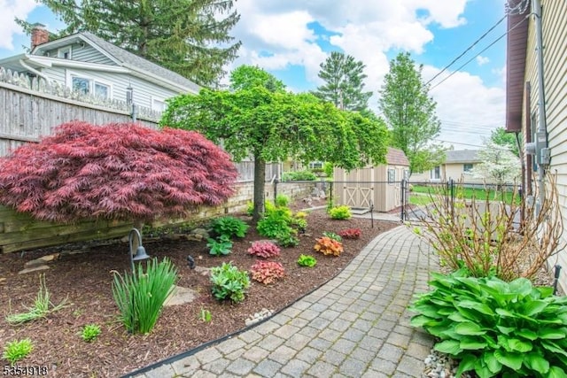 12 Johnson Ave, Hopatcong Boro, NJ 07843 - fenced backyard with a shed and an outdoor structure