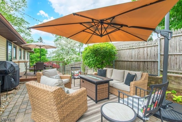 12 Johnson Ave, Hopatcong Boro, NJ 07843 - wooden terrace featuring an outdoor living space with a fire pit, area for grilling, a fenced backyard, and outdoor dining area