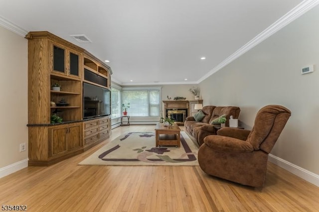 217 Long Hill Rd, Hillsborough Twp, NJ 08844 - living room featuring light wood-style floors, baseboards, ornamental molding, a glass covered fireplace, and recessed lighting