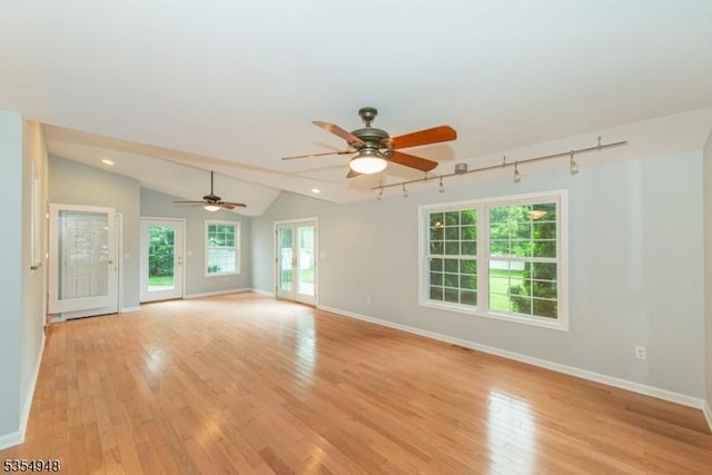70 Crenshaw Dr, Mount Olive Twp, NJ 07836 - spare room with light wood-style floors, ceiling fan, rail lighting, vaulted ceiling, and recessed lighting