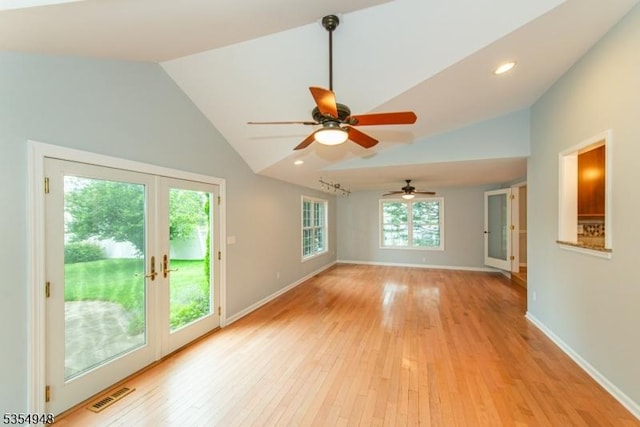 70 Crenshaw Dr, Mount Olive Twp, NJ 07836 - empty room with vaulted ceiling, french doors, light wood-style flooring, a ceiling fan, and recessed lighting
