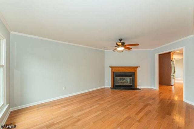 70 Crenshaw Dr, Mount Olive Twp, NJ 07836 - unfurnished living room with ceiling fan, crown molding, light wood-style floors, and a fireplace with flush hearth