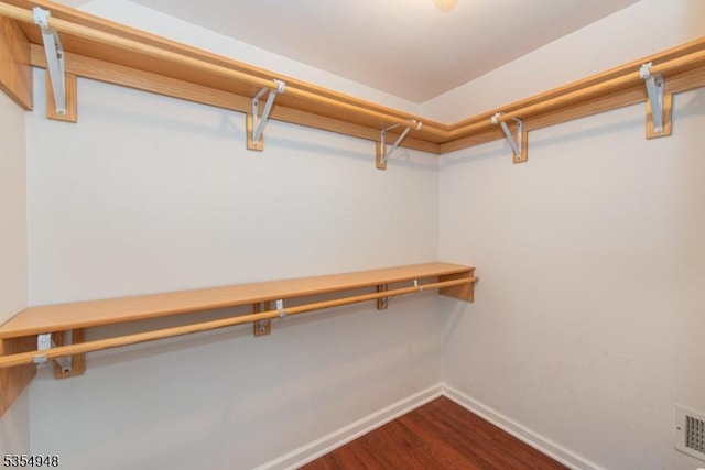70 Crenshaw Dr, Mount Olive Twp, NJ 07836 - walk in closet featuring dark wood-style flooring