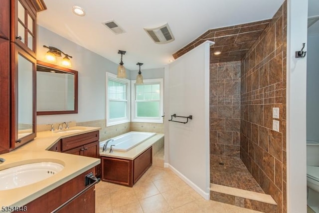 70 Crenshaw Dr, Mount Olive Twp, NJ 07836 - bathroom featuring vanity, walk in shower, a bath, and tile patterned flooring