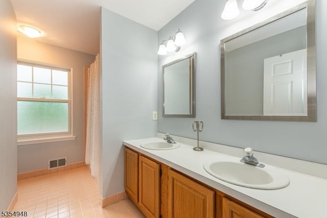 70 Crenshaw Dr, Mount Olive Twp, NJ 07836 - full bathroom featuring double vanity and tile patterned floors