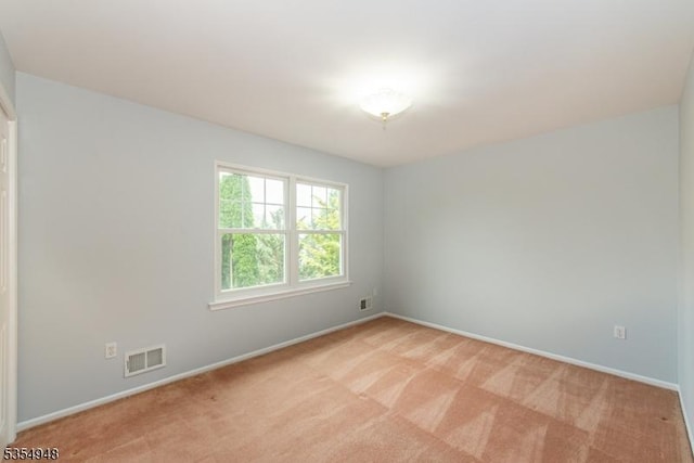70 Crenshaw Dr, Mount Olive Twp, NJ 07836 - unfurnished room with light carpet and baseboards
