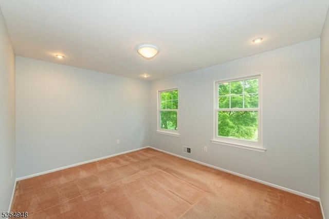 70 Crenshaw Dr, Mount Olive Twp, NJ 07836 - empty room with light carpet and baseboards