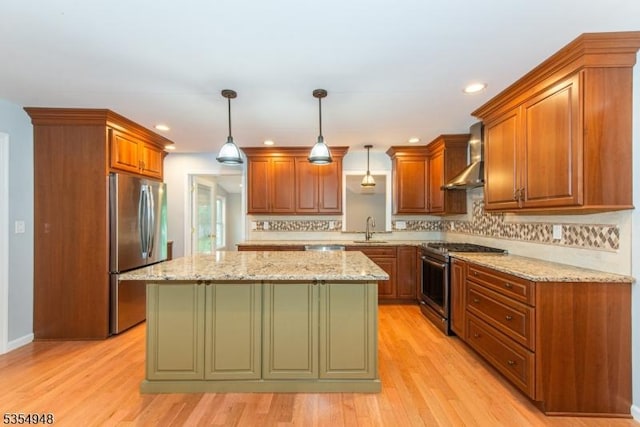 70 Crenshaw Dr, Mount Olive Twp, NJ 07836 - kitchen with stainless steel appliances, wall chimney exhaust hood, tasteful backsplash, a kitchen island, and light wood-style flooring