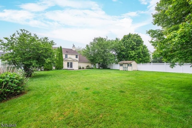 70 Crenshaw Dr, Mount Olive Twp, NJ 07836 - fenced backyard featuring a storage unit