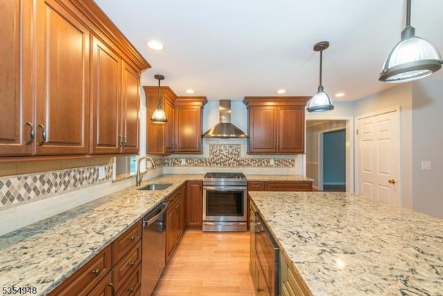 70 Crenshaw Dr, Mount Olive Twp, NJ 07836 - kitchen featuring wall chimney exhaust hood, stainless steel appliances, light stone counters, brown cabinets, and recessed lighting