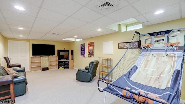 living room with recessed lighting, visible vents, a paneled ceiling, and carpet