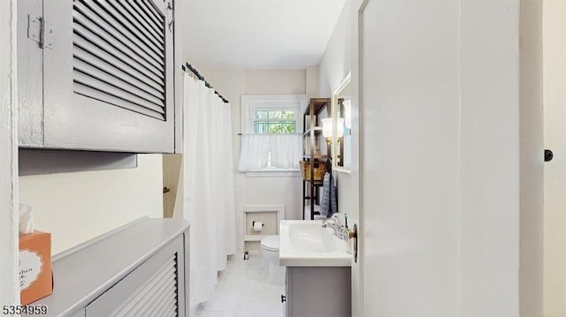 full bath with vanity and toilet