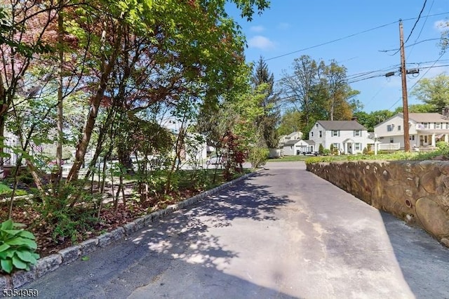 view of road featuring a residential view