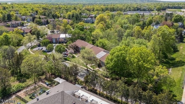aerial view with a wooded view