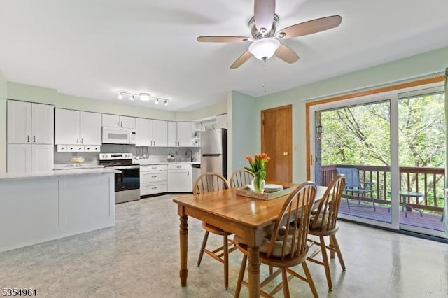 dining area with ceiling fan