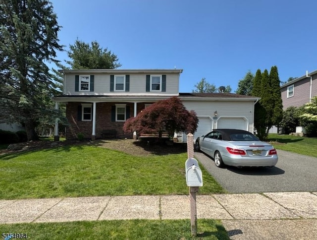 76 Point View Pkwy, Wayne Twp, NJ 07470 - traditional-style home with a garage, driveway, a front lawn, and covered porch