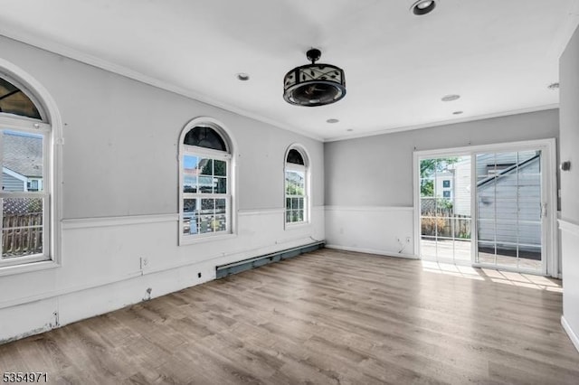 123 Robbinwood Ter, Linden City, NJ 07036 - spare room featuring ornamental molding, healthy amount of natural light, wood finished floors, a wainscoted wall, and recessed lighting