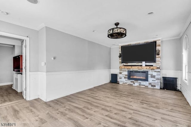 123 Robbinwood Ter, Linden City, NJ 07036 - unfurnished living room with a fireplace, wood finished floors, radiator heating unit, and crown molding