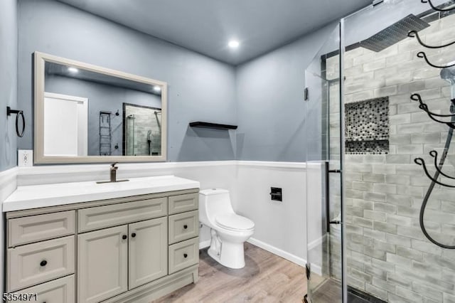 123 Robbinwood Ter, Linden City, NJ 07036 - full bathroom featuring a shower stall, wood finished floors, vanity, toilet, and recessed lighting