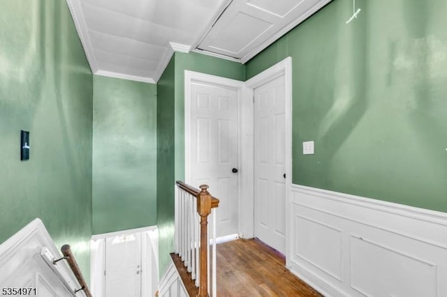 123 Robbinwood Ter, Linden City, NJ 07036 - corridor featuring an upstairs landing, ornamental molding, wood finished floors, a wainscoted wall, and a decorative wall