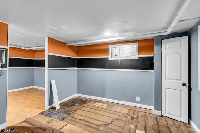 123 Robbinwood Ter, Linden City, NJ 07036 - below grade area with baseboards and wood finished floors