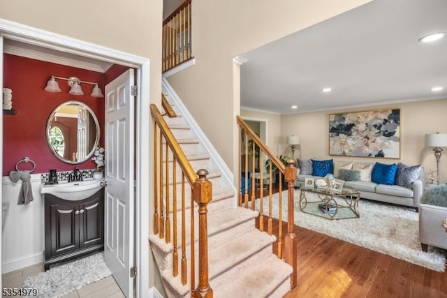 8 Congress Ln, South River Boro, NJ 08882 - stairway featuring recessed lighting, ornamental molding, and wood finished floors