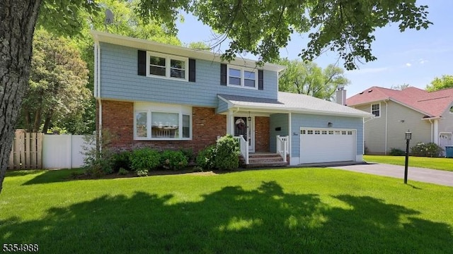 3 Grant St, Cranford Twp, NJ 07016 - traditional home with driveway, an attached garage, and brick siding