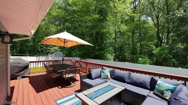 3 Grant St, Cranford Twp, NJ 07016 - wooden deck with outdoor lounge area, outdoor dining area, and a fenced backyard