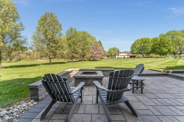 view of patio / terrace featuring a fire pit