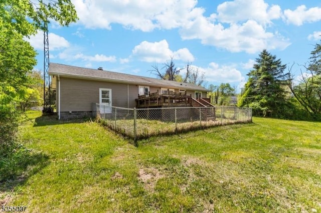 back of house featuring a wooden deck and stairs