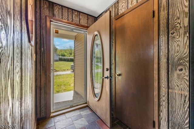 entrance foyer featuring stone tile flooring