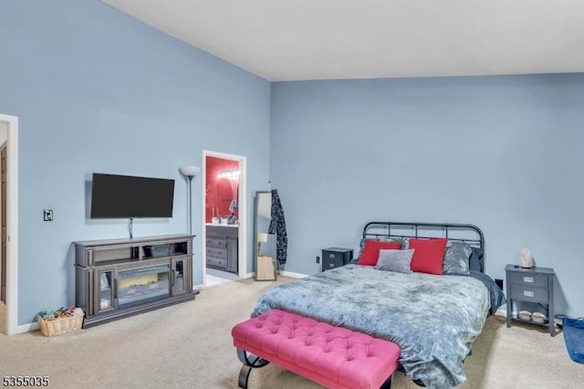 bedroom featuring carpet flooring and baseboards