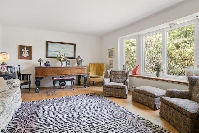2 Woods End Rd, Parsippany-Troy Hills Twp, NJ 07950 - sitting room with ornamental molding, wood finished floors, and a healthy amount of sunlight