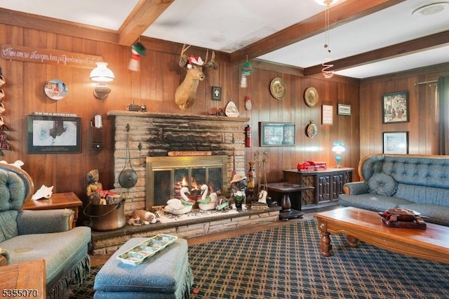2 Woods End Rd, Parsippany-Troy Hills Twp, NJ 07950 - carpeted living room featuring wooden walls, beamed ceiling, and a stone fireplace