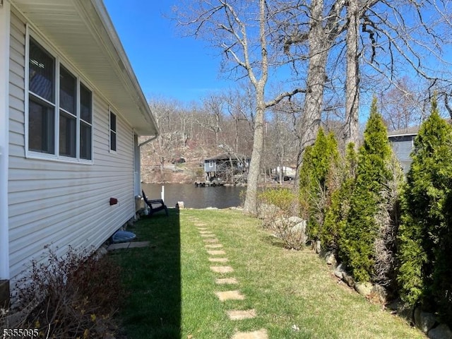 view of yard with a water view