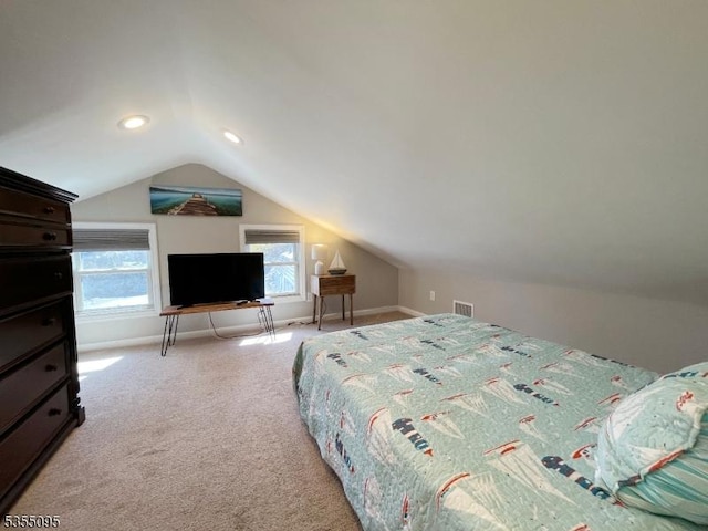 carpeted bedroom featuring recessed lighting, baseboards, and lofted ceiling